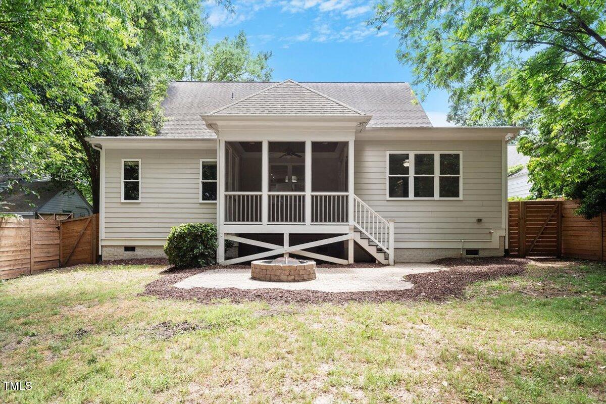 715 Kimbrough Street Raleigh, NC 27608 - Photo 38 of 42 a view of a house with backyard and sitting area