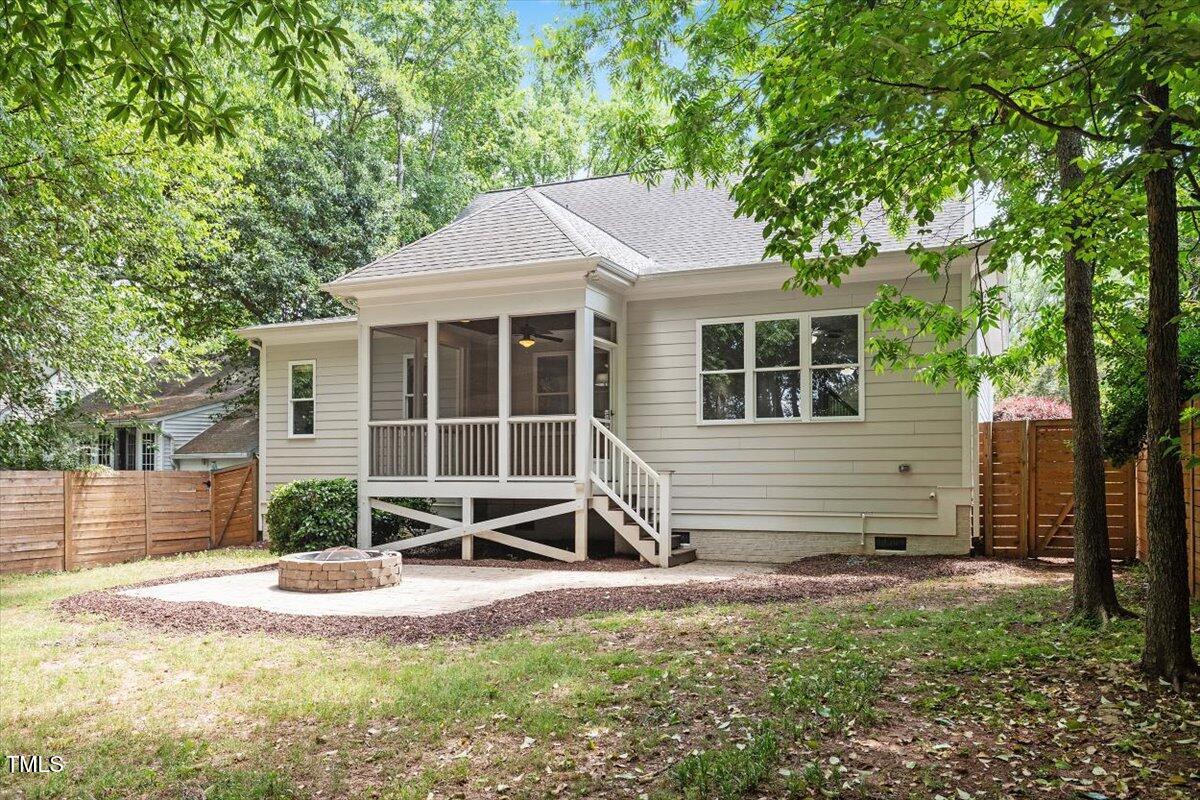 715 Kimbrough Street Raleigh, NC 27608 - Photo 39 of 42 a view of a house with backyard