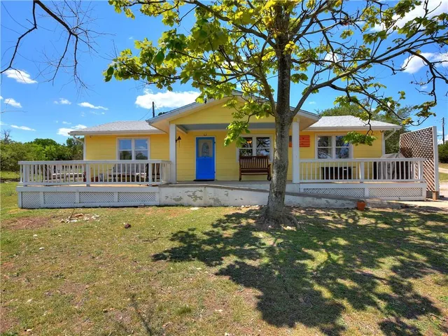 a view of backyard with green space