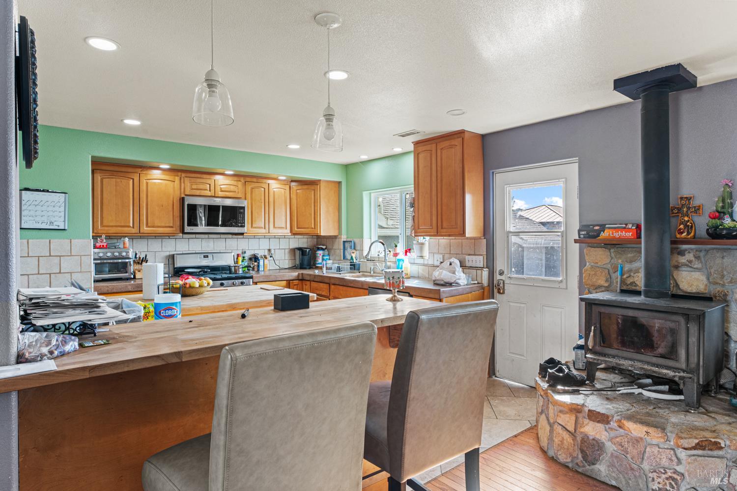 3700 Ruddick Cunningham Road Ukiah, CA 95482 - Photo 23 of 27 a kitchen with a sink a stove cabinets and a counter top space