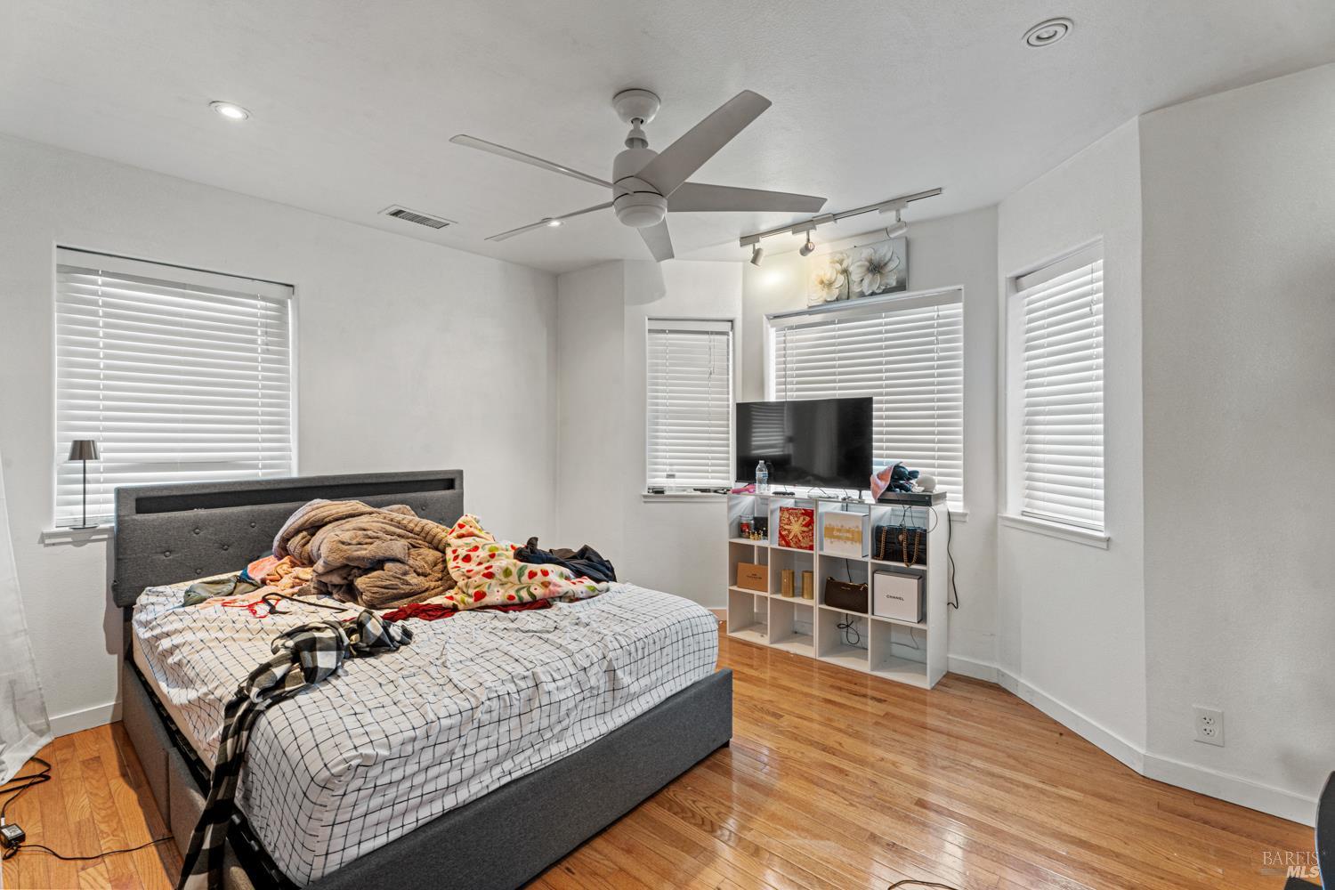 3700 Ruddick Cunningham Road Ukiah, CA 95482 - Photo 25 of 27 a bedroom with a bed and a flat screen tv