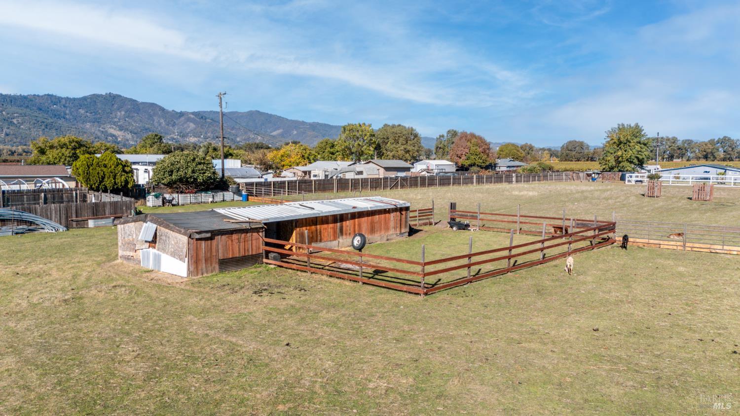 3700 Ruddick Cunningham Road Ukiah, CA 95482 - Photo 6 of 27 a view of a swimming pool with a lounge chair