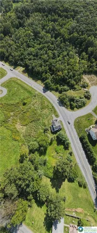 a view of a lake with a yard