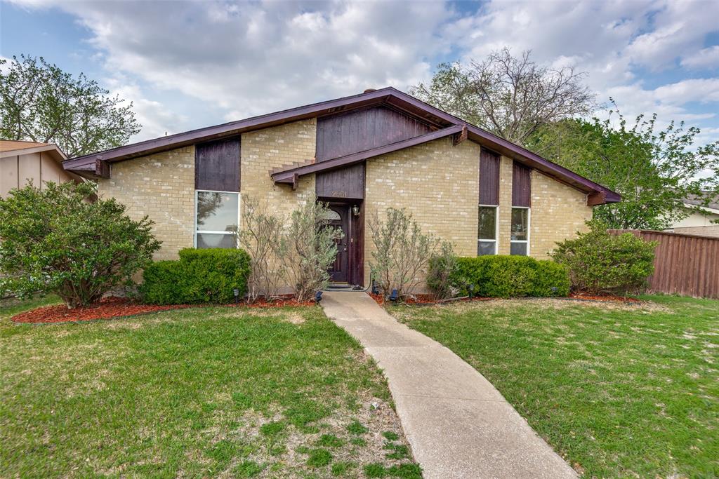 2051 Kings Road Carrollton, TX 75007 - Photo 1 of 1 a backyard of a house with plants and barbeque oven