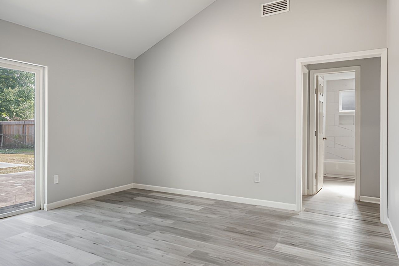 415 Bellmar Lane Friendswood, TX 77546 - Photo 7 of 34 wooden floor in an empty room