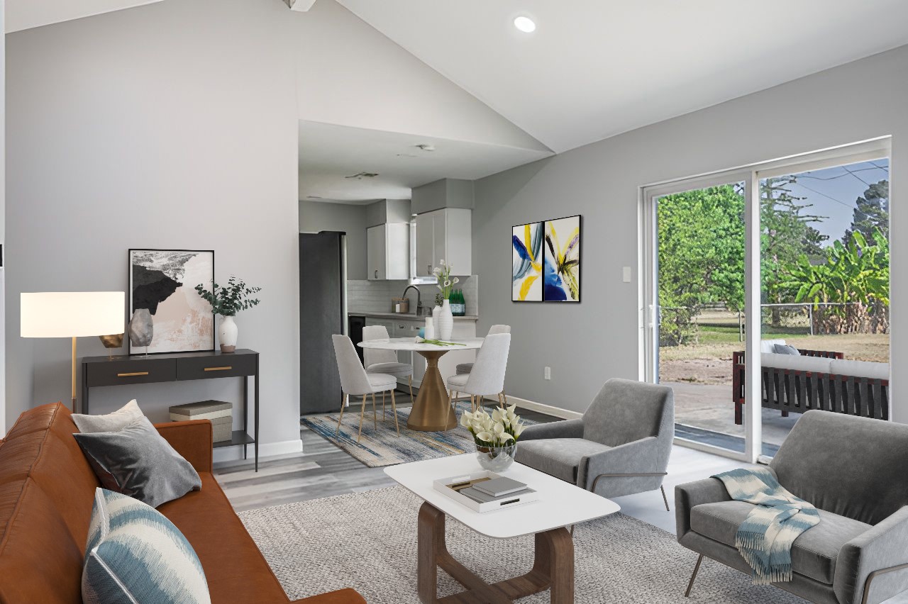 415 Bellmar Lane Friendswood, TX 77546 - Photo 9 of 34 a living room with furniture a fireplace and a large window