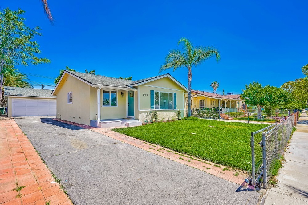 17350 Reed Street Fontana, CA 92336 - Photo 1 of 1 a view of a house with a yard