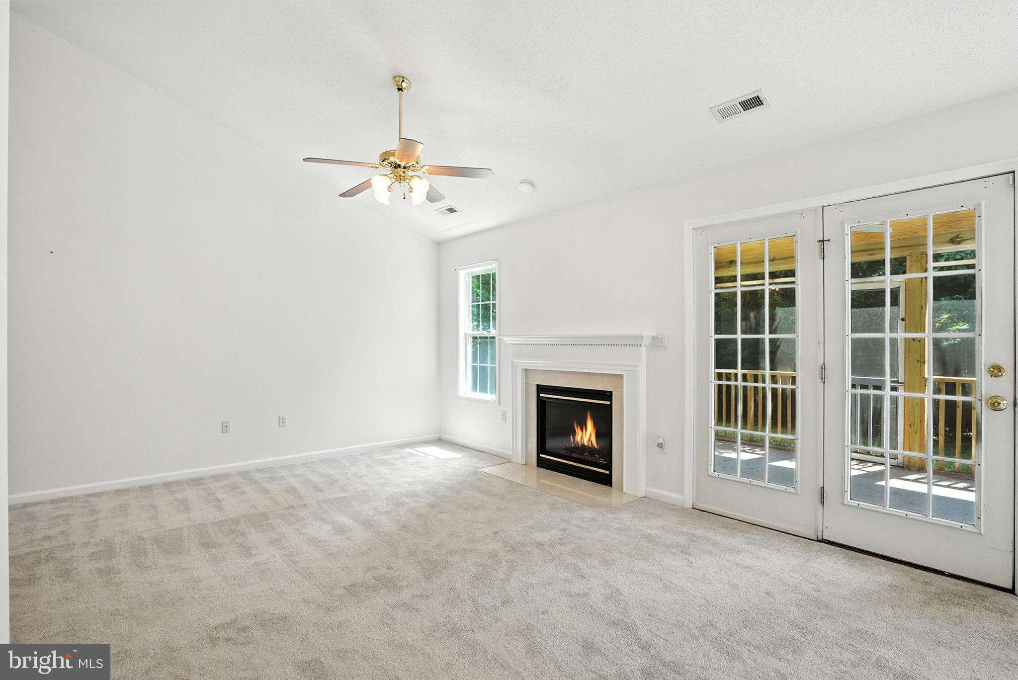 808 Ripplebrook Drive Culpeper, VA 22701 - Photo 13 of 48 a view of empty room with a fireplace