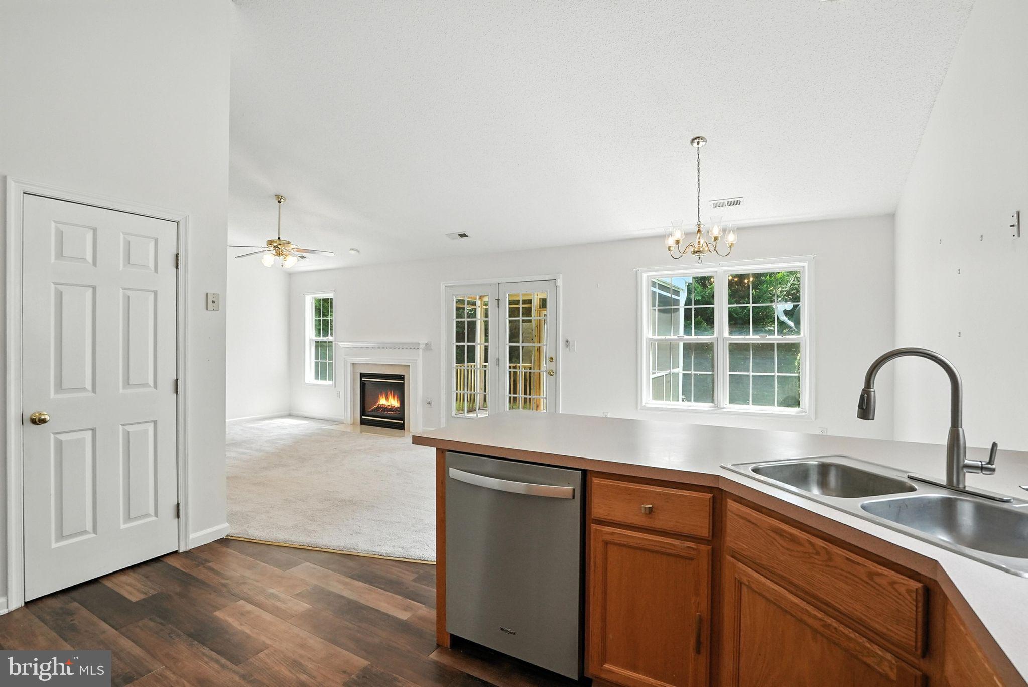 808 Ripplebrook Drive Culpeper, VA 22701 - Photo 19 of 48 a kitchen with a sink cabinets and wooden floor