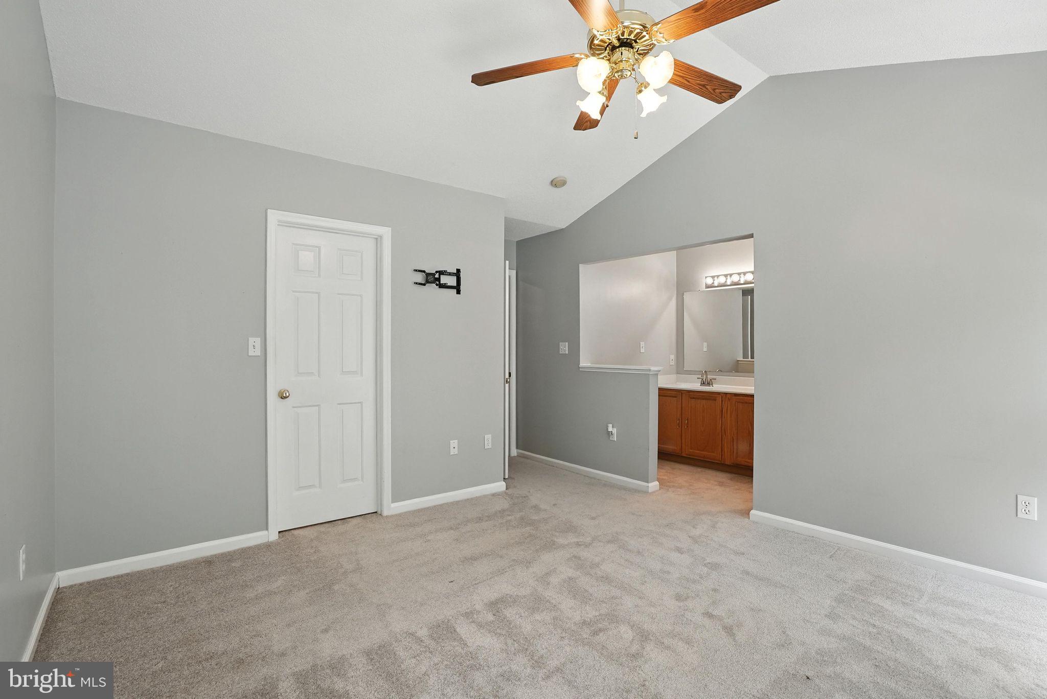 808 Ripplebrook Drive Culpeper, VA 22701 - Photo 24 of 48 an empty room with a bathroom and a ceiling fan