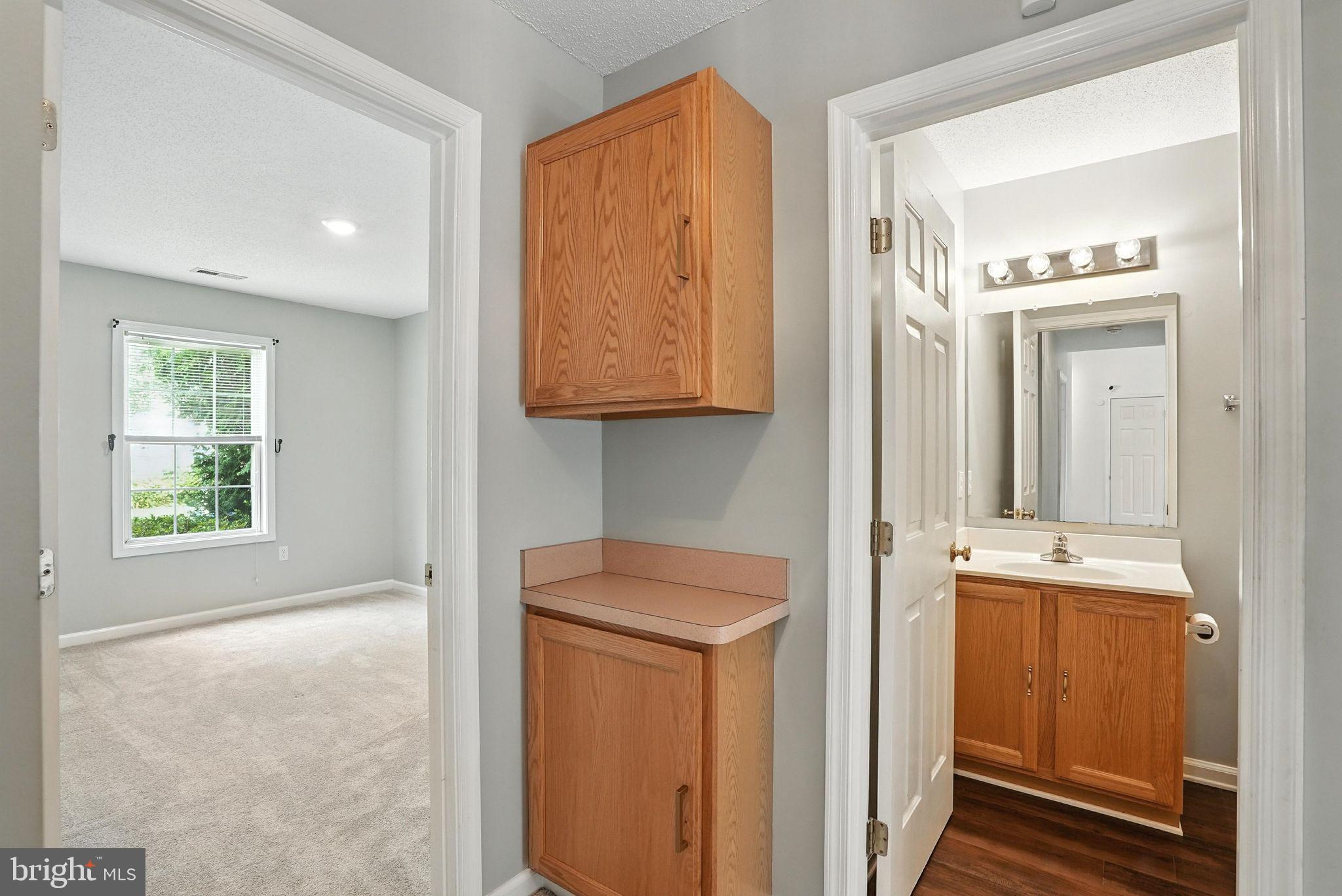 808 Ripplebrook Drive Culpeper, VA 22701 - Photo 35 of 48 a view of hallway with washer and dryer