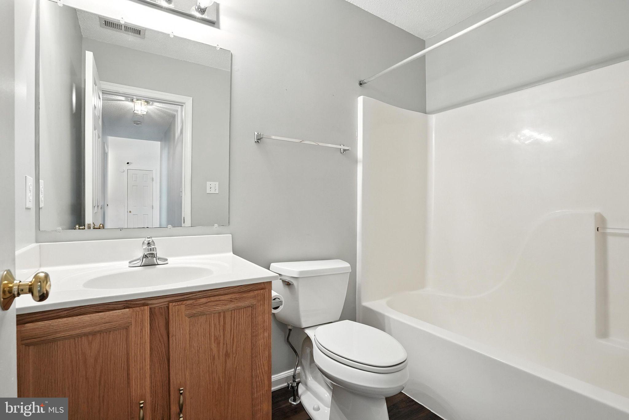 808 Ripplebrook Drive Culpeper, VA 22701 - Photo 36 of 48 a bathroom with a sink and a mirror