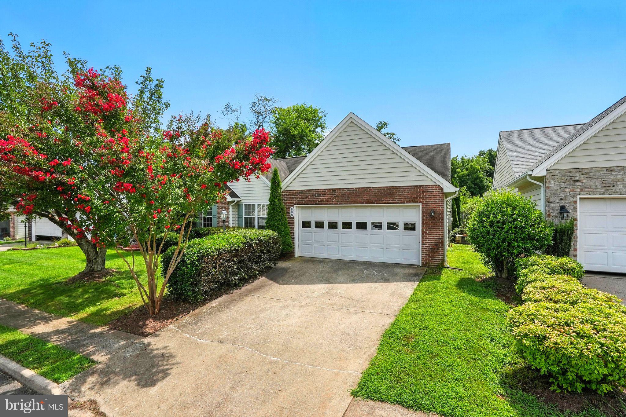 808 Ripplebrook Drive Culpeper, VA 22701 - Photo 4 of 48 a front view of a house with a yard and garage