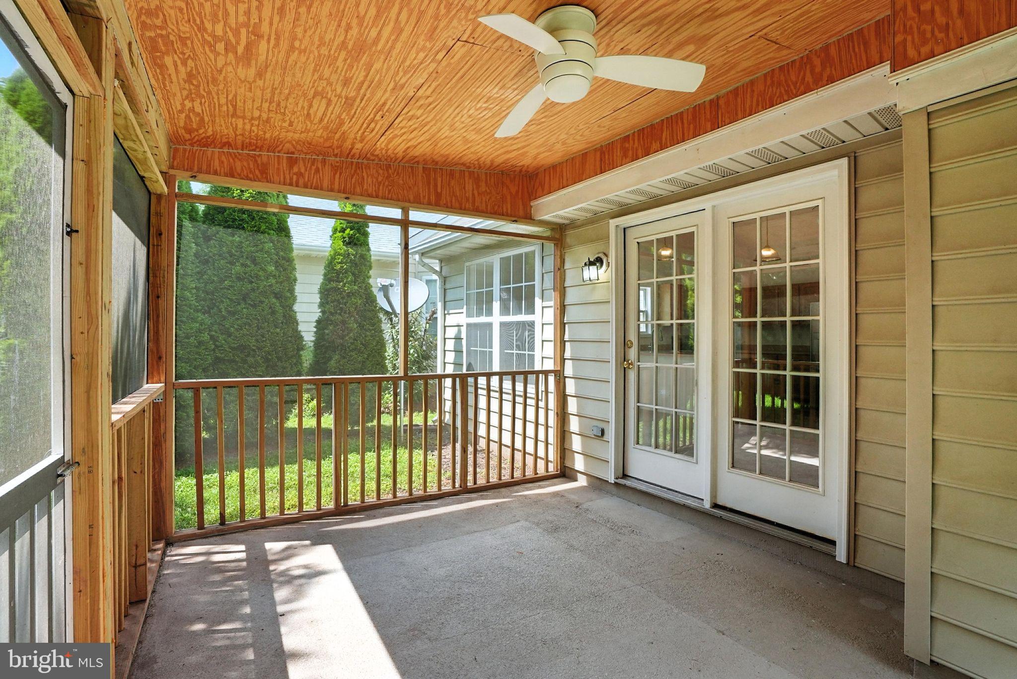 808 Ripplebrook Drive Culpeper, VA 22701 - Photo 42 of 48 a view of a porch with a tv