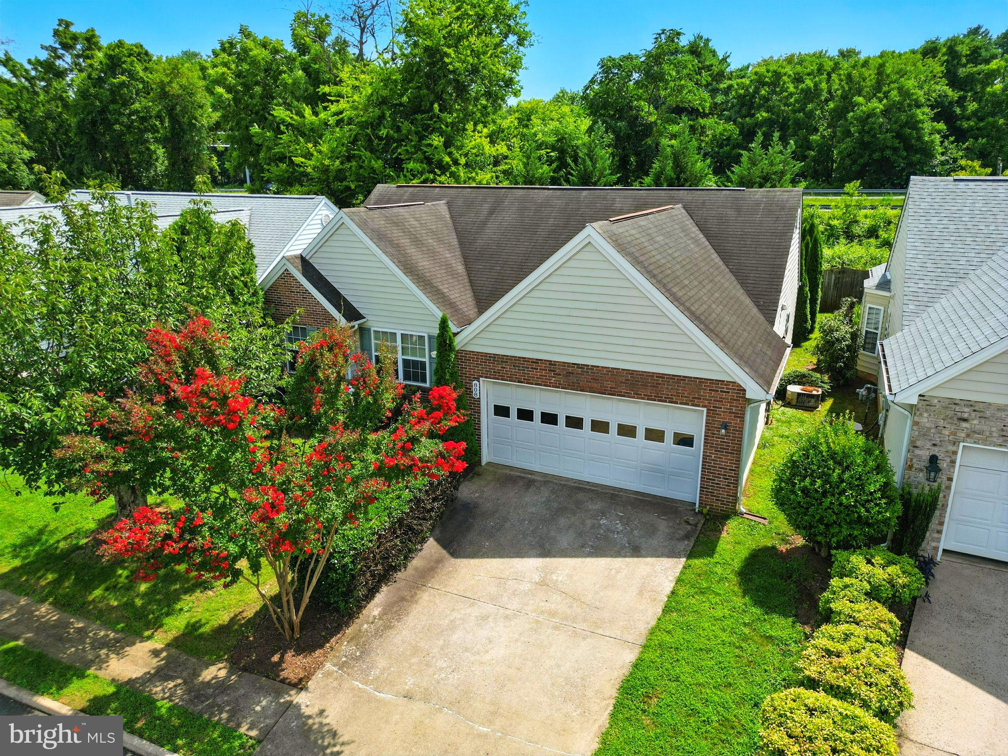 808 Ripplebrook Drive Culpeper, VA 22701 - Photo 5 of 48 a aerial view of a house with a yard and potted plants