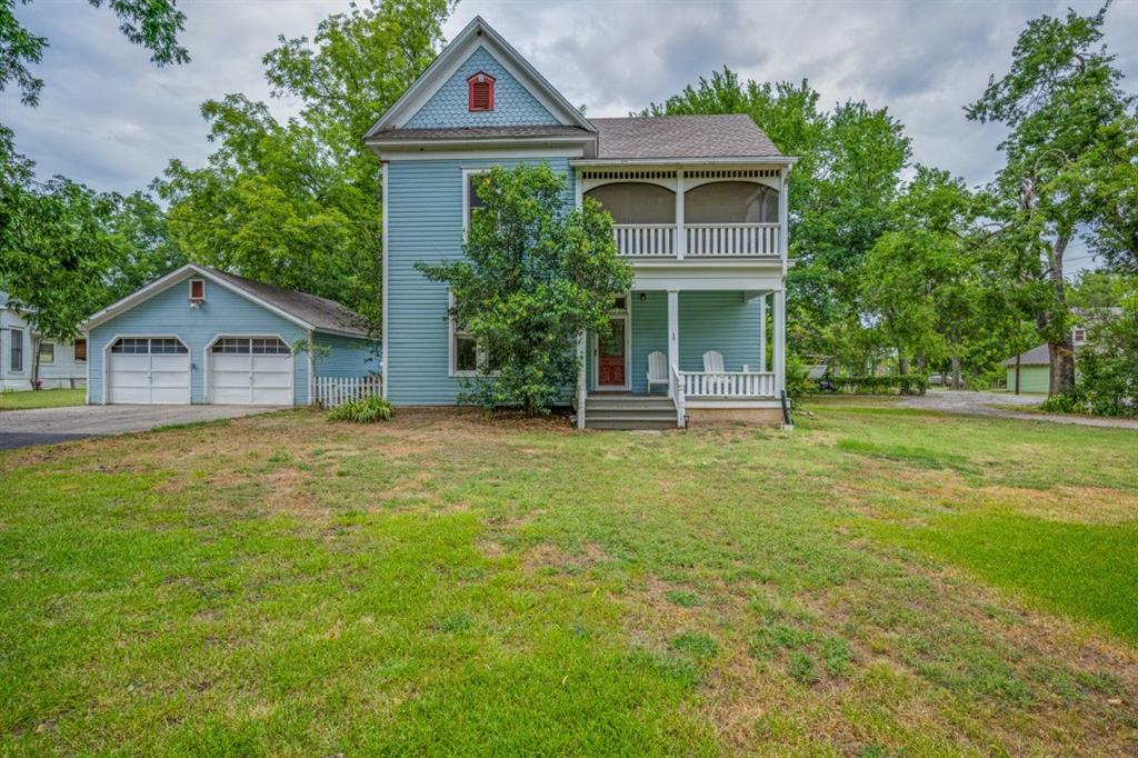 322 East Main Street Pilot Point, TX 76258 - Photo 1 of 1 a front view of a house with garden