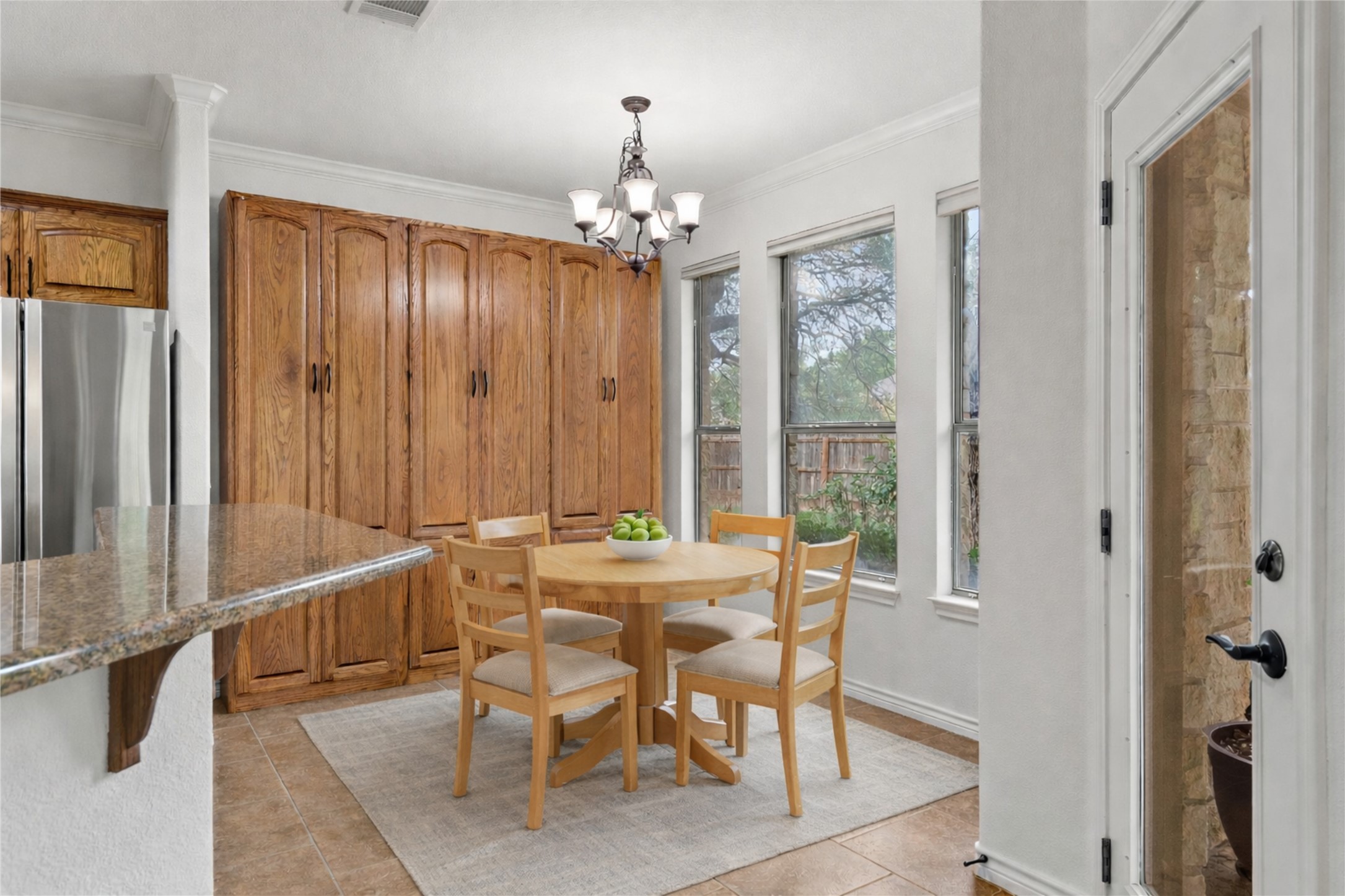 4612 Sonora Trace Georgetown, TX 78633 - Photo 5 of 36 a view of a dining room with furniture and chandelier