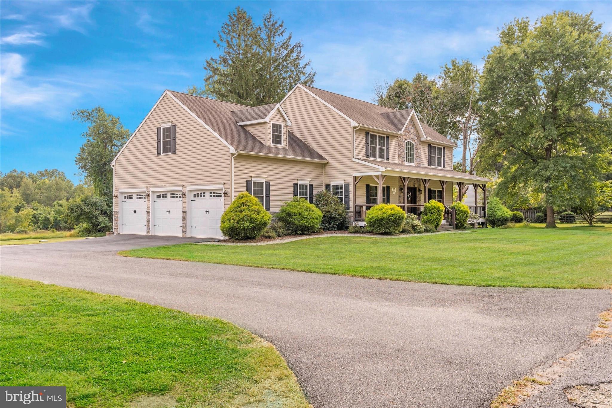 Stately Colonial w/Turned 3-Car Garage
