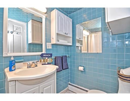 123 Hardy Pond Road Waltham, MA 02451 - Photo 18 of 30 a bathroom with a sink a toilet and a mirror