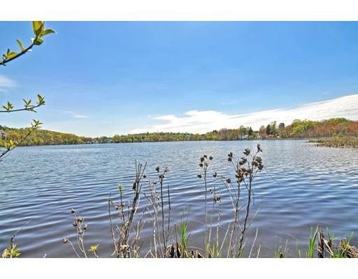 123 Hardy Pond Road Waltham, MA 02451 - Photo 29 of 30 a view of a lake with table and chairs