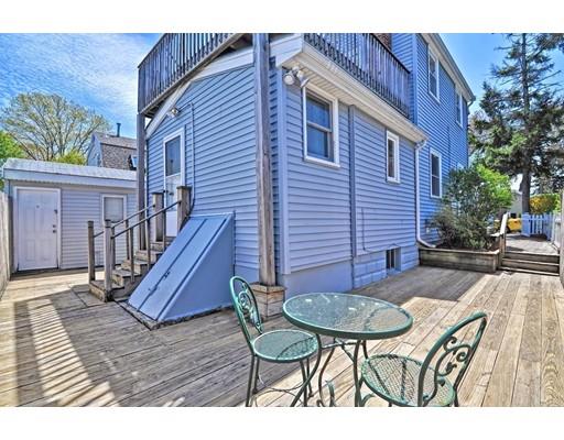 123 Hardy Pond Road Waltham, MA 02451 - Photo 5 of 30 a view of a patio with table and chairs with wooden floor and plants
