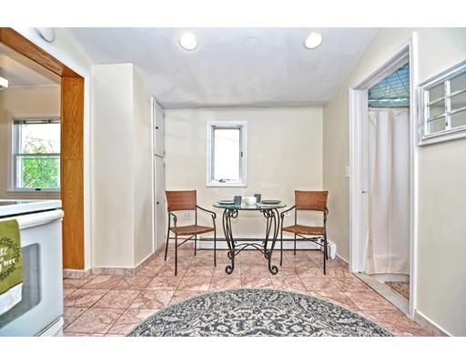 123 Hardy Pond Road Waltham, MA 02451 - Photo 10 of 30 a living room with furniture and a window