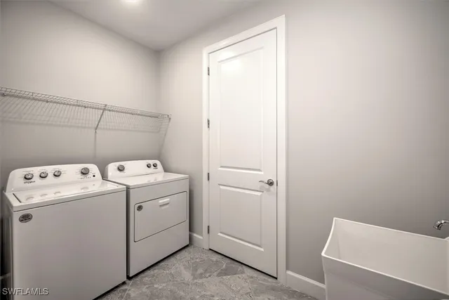 a view of a house with backyard and porch