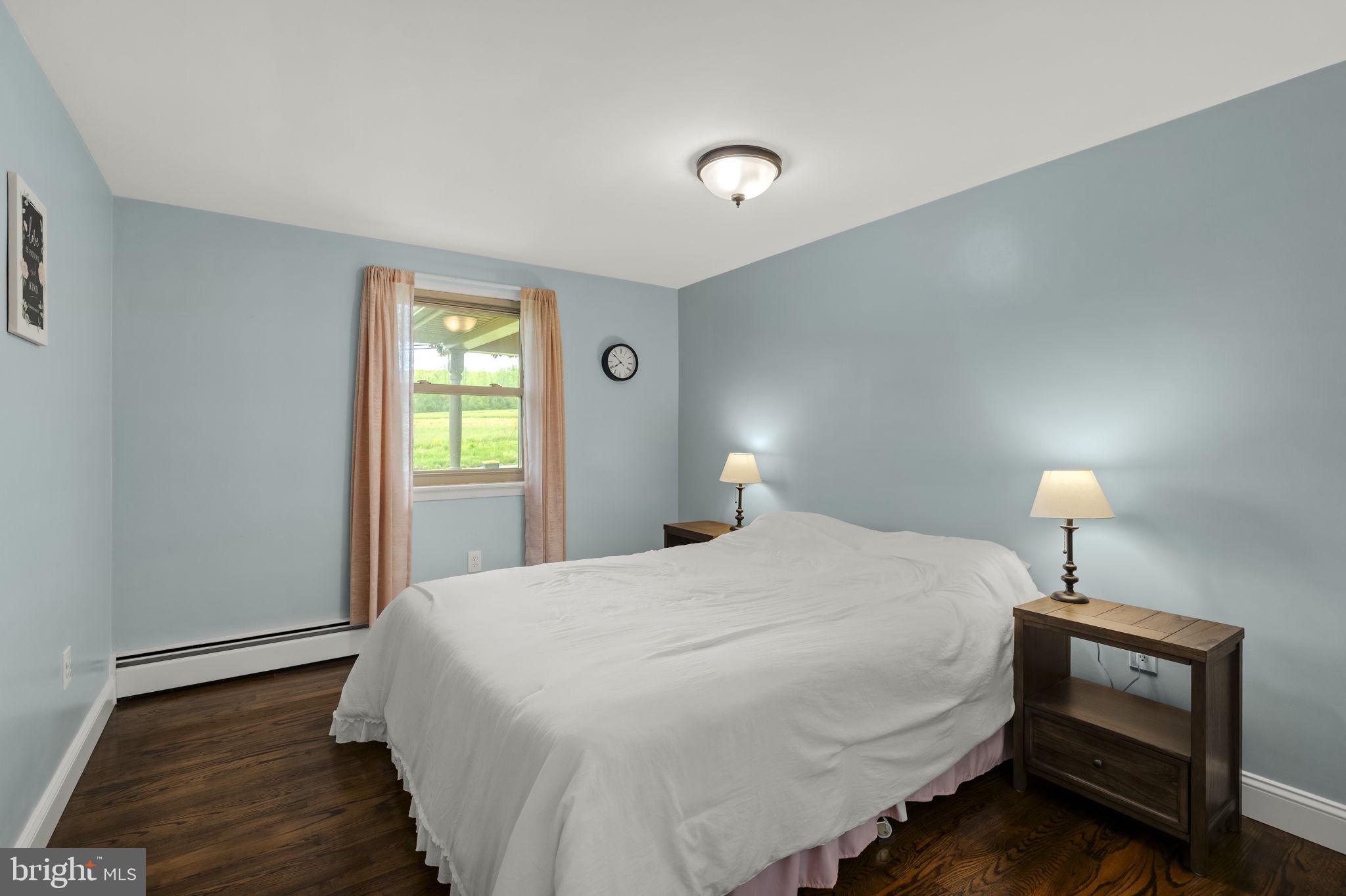 1160 Narvon Road Narvon, PA 17555 - Photo 37 of 64 a bedroom with a bed and a lamp