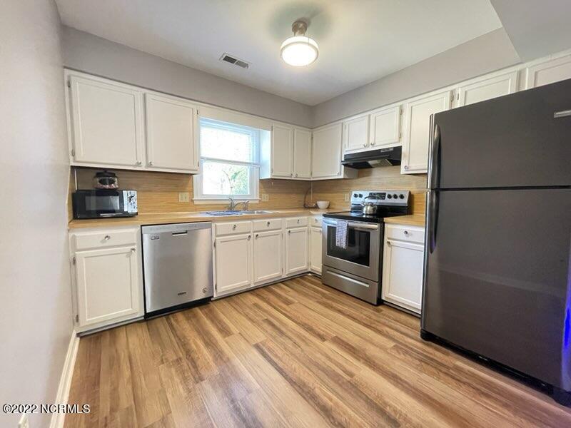 1874 Quail Ridge Road, Unit C Greenville, NC 27858 - Photo 9 of 25 IMG_1644
