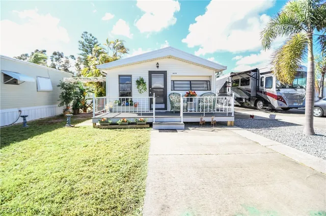 a front view of a house with a patio