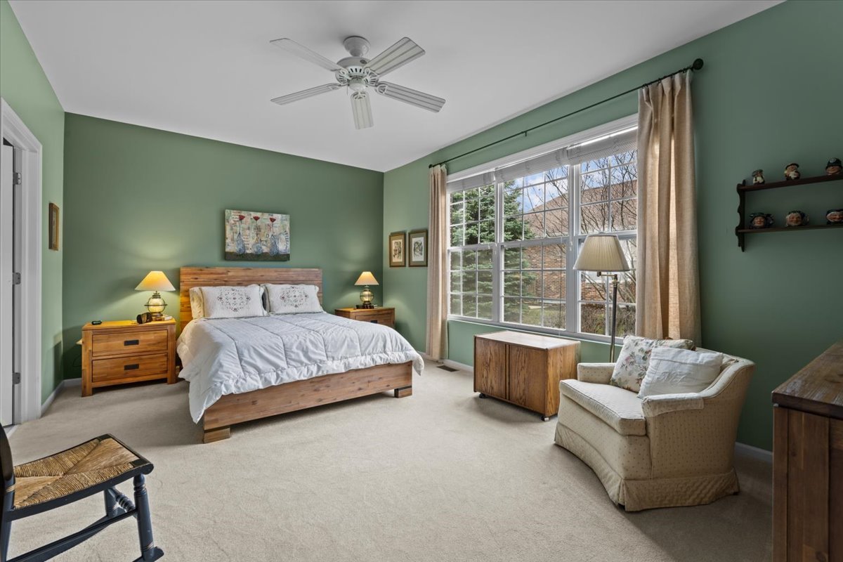 2866 Bond Circle Naperville, IL 60563 - Photo 13 of 28 a bedroom with a bed and a couch