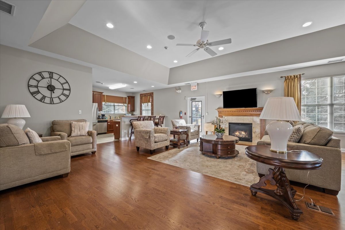 2866 Bond Circle Naperville, IL 60563 - Photo 24 of 28 a living room with furniture and a flat screen tv
