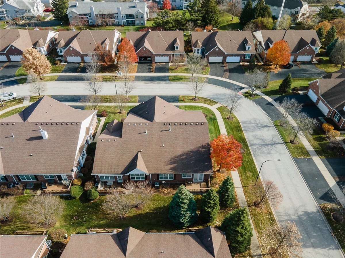 2866 Bond Circle Naperville, IL 60563 - Photo 28 of 28 an aerial view of a house with swimming pool and outdoor seating