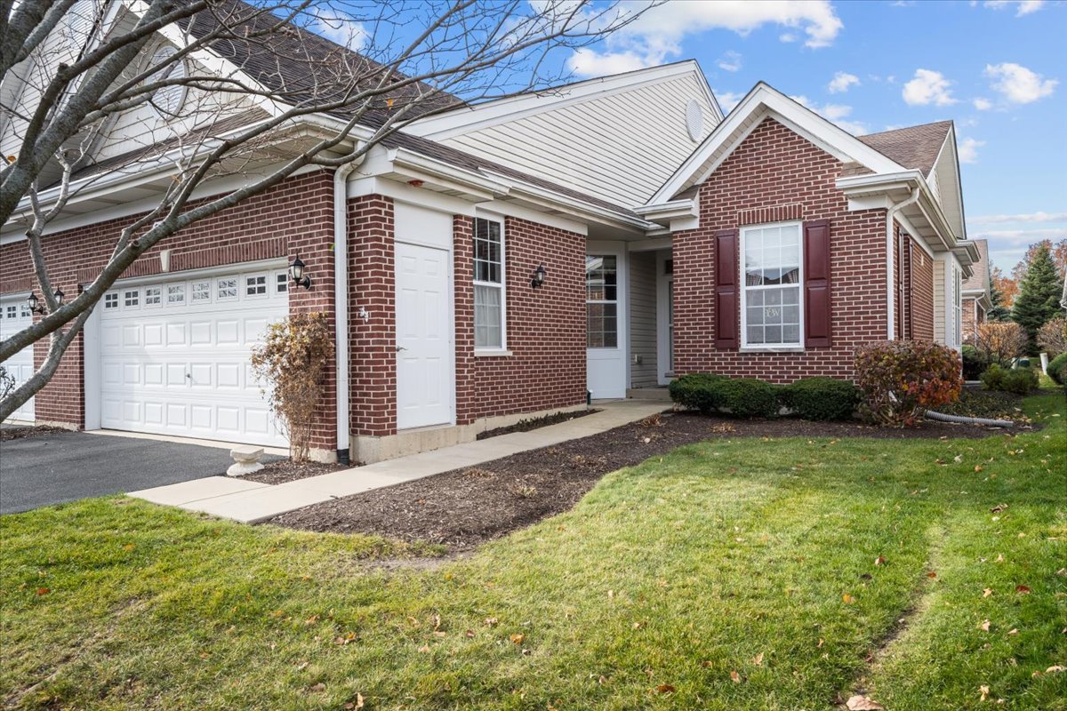 2866 Bond Circle Naperville, IL 60563 - Photo 3 of 28 a front view of a house with garden