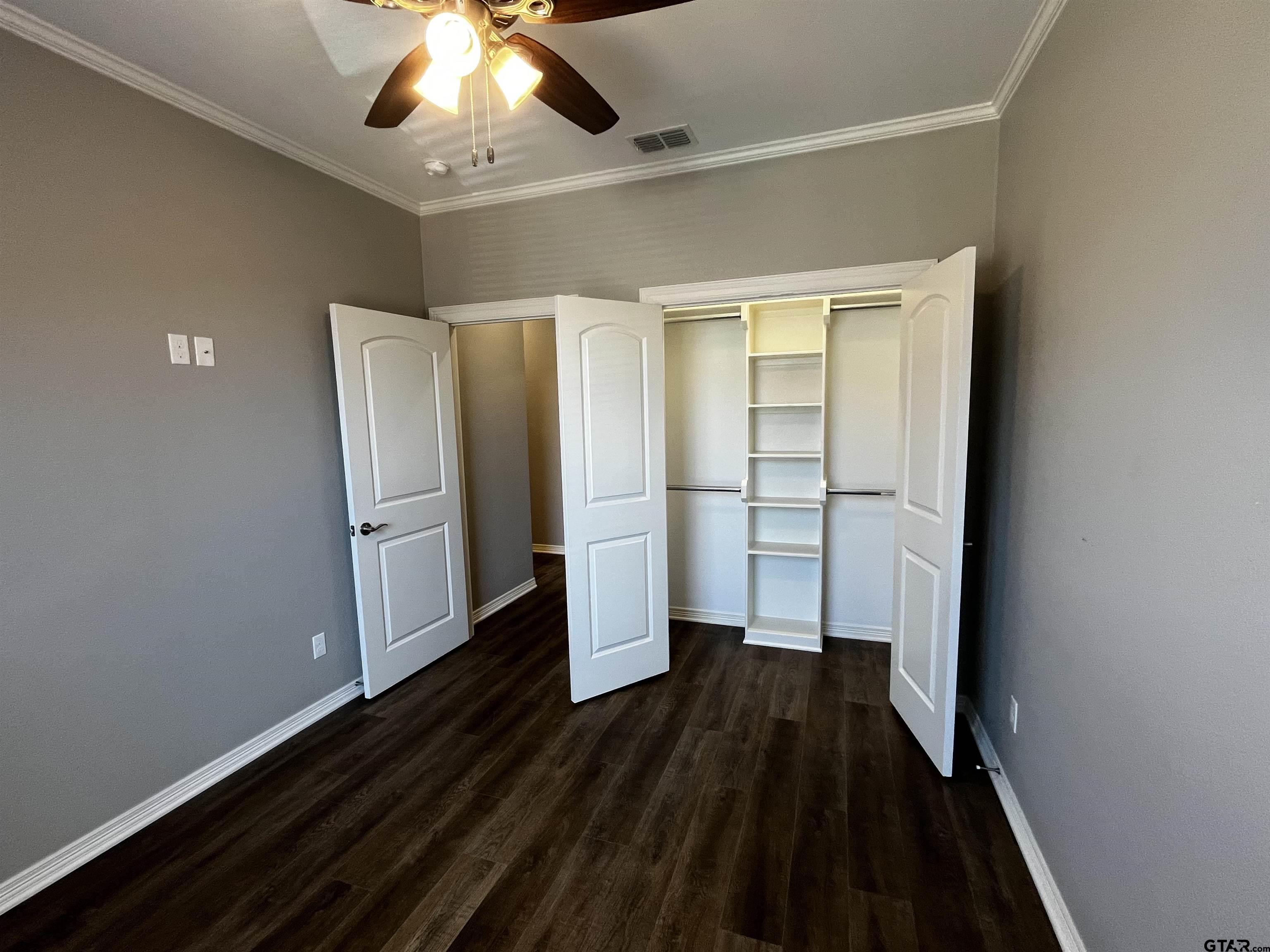 136 Letha Court Tyler, TX 75702 - Photo 19 of 34 a view of empty room with wooden floor