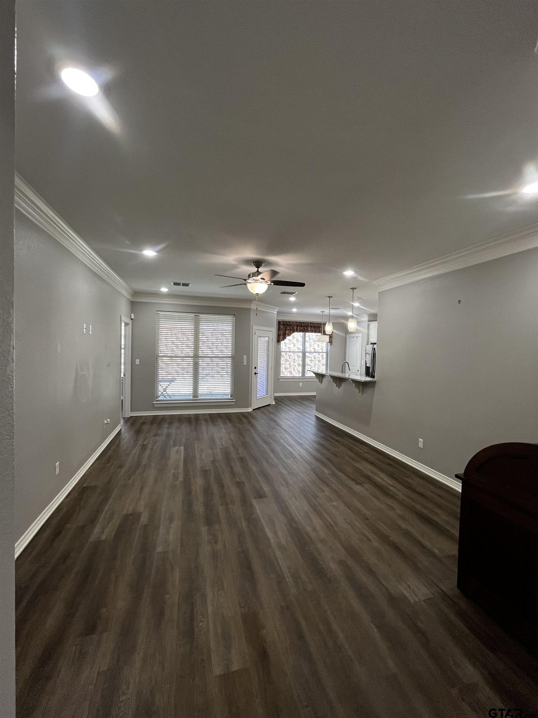 136 Letha Court Tyler, TX 75702 - Photo 4 of 34 a view of empty room with wooden floor