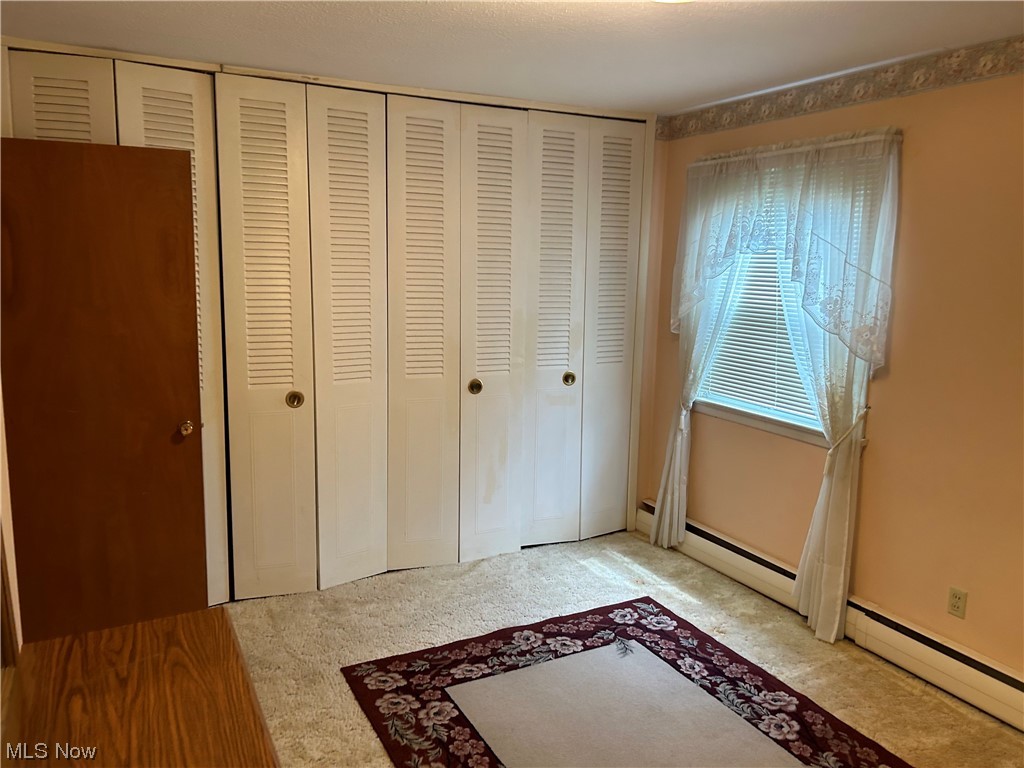 419 High Meadow Road Amherst, OH 44001 - Photo 16 of 27 Peach Bedroom