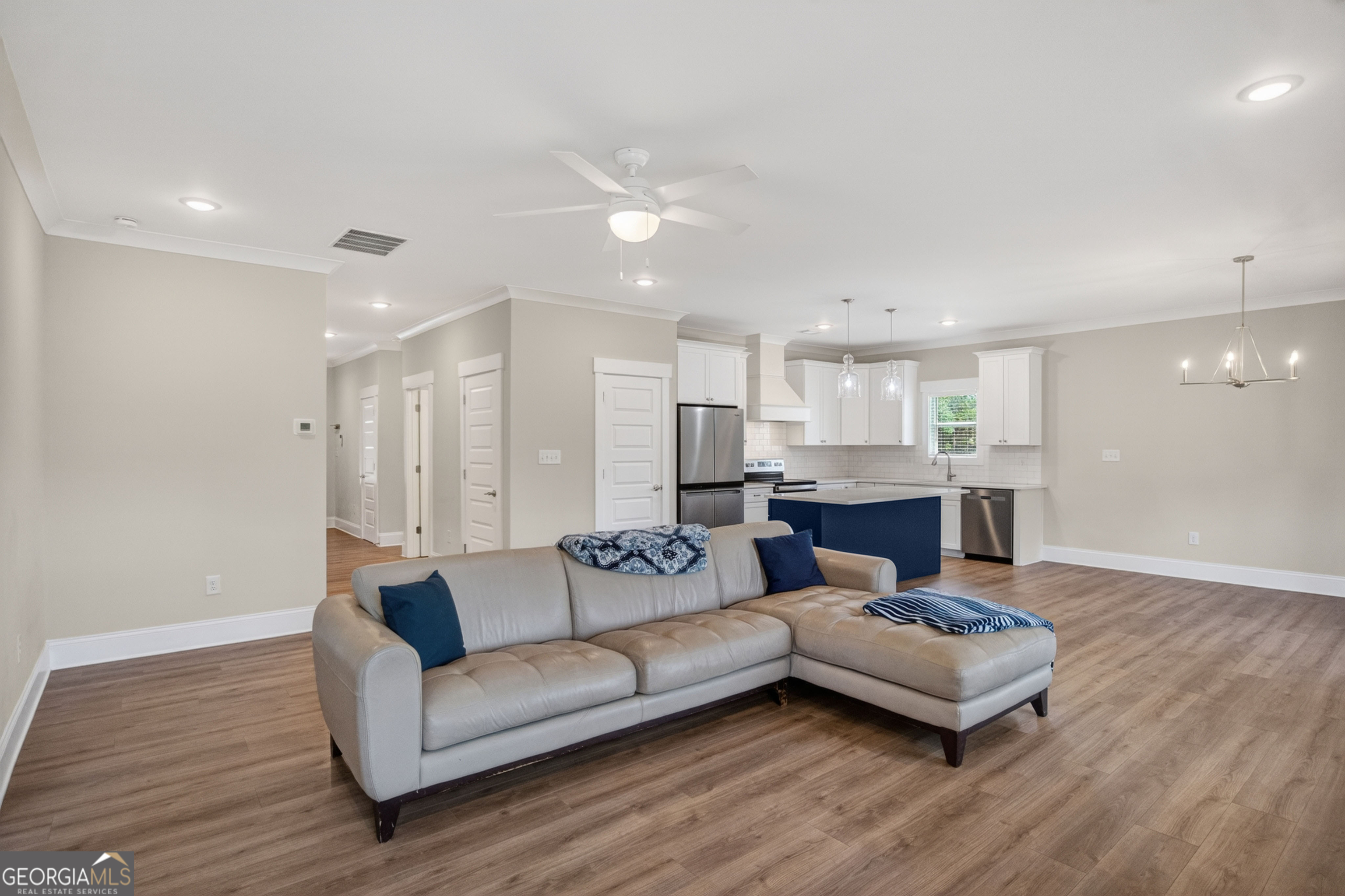 1350-c O Draper Road Comer, GA 30629 - Photo 39 of 47 a living room with furniture and a wooden floor