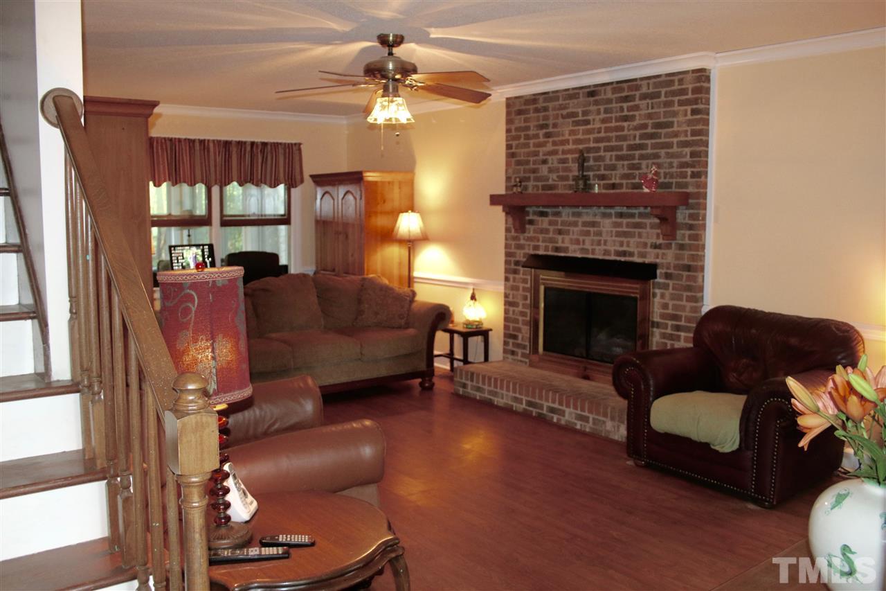 3309 Taylors Ridge Road Wake Forest, NC 27587 - Photo 2 of 17 Warm and inviting family room.
