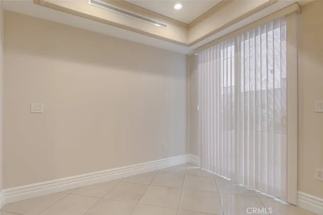 a kitchen with stainless steel appliances a refrigerator and a stove top oven