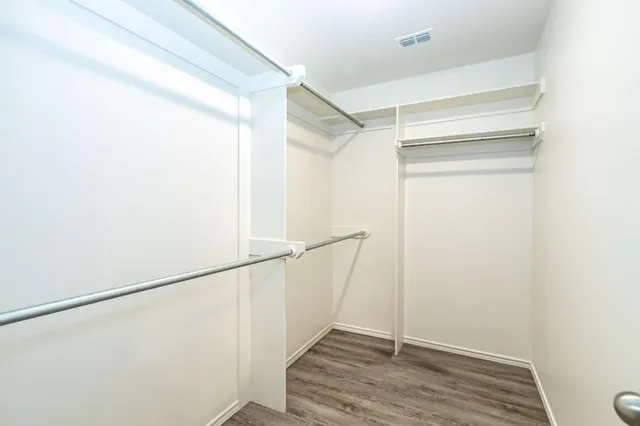 a view of an empty walk in closet