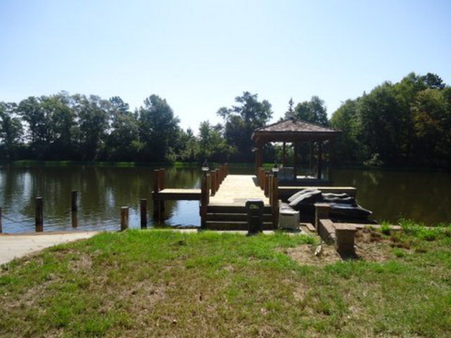 1900 Bonner Gilbert Road Macon, GA 31220 - Photo 12 of 15 a garden view with a lake view