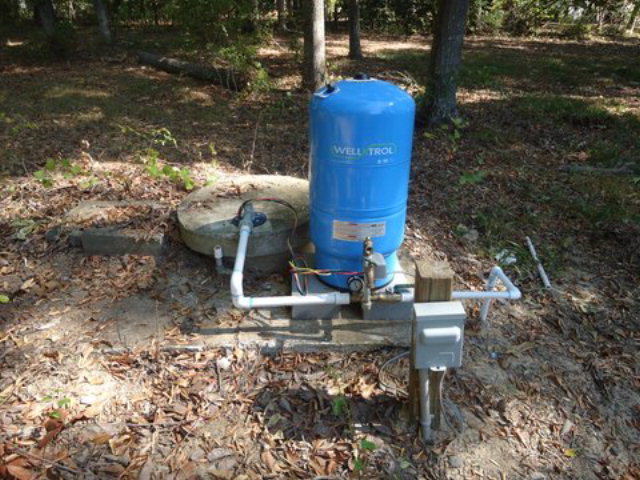 1900 Bonner Gilbert Road Macon, GA 31220 - Photo 14 of 15 a backyard of a house with table and chairs