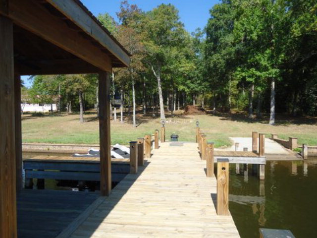 1900 Bonner Gilbert Road Macon, GA 31220 - Photo 7 of 15 a backyard of a house with table and chairs