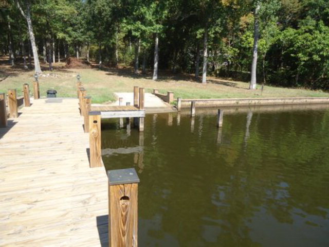 1900 Bonner Gilbert Road Macon, GA 31220 - Photo 8 of 15 a view of a swimming pool with a yard