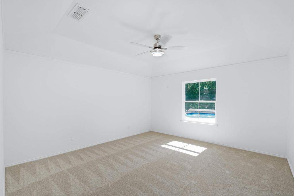 4501 Ridgeway Road Fort Worth, TX 76126 - Photo 18 of 39 an empty room with a window