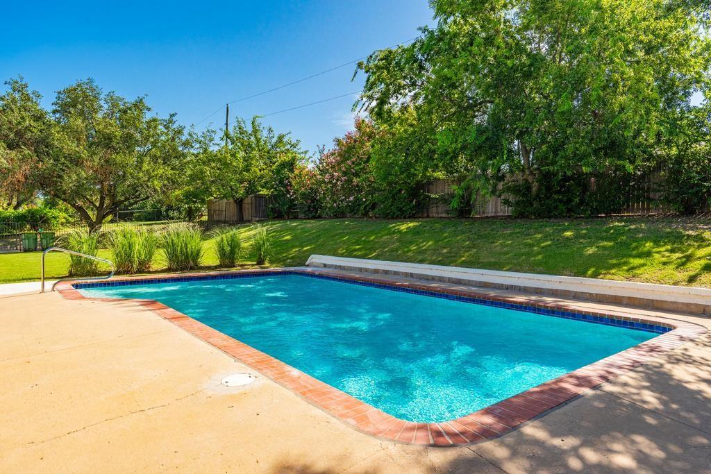 4501 Ridgeway Road Fort Worth, TX 76126 - Photo 31 of 39 a view of a outdoor space with a swimming pool