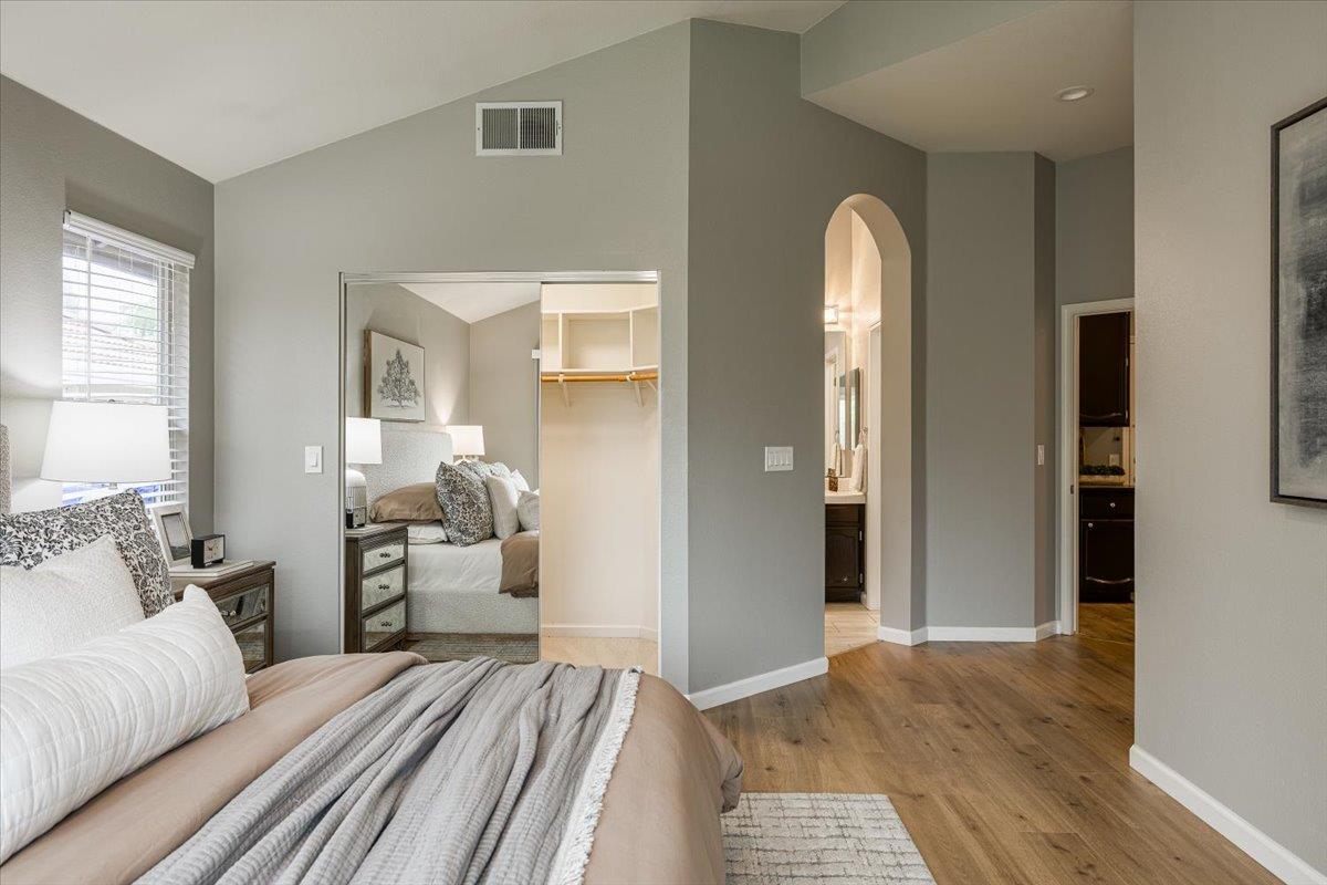 114 Kerwin Way Folsom, CA 95630 - Photo 17 of 29 a bedroom with bed and wooden floor