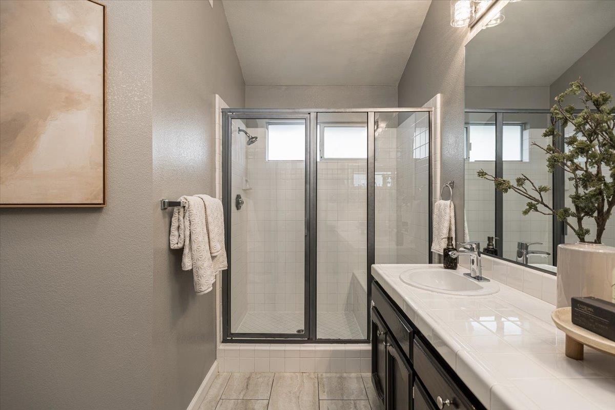114 Kerwin Way Folsom, CA 95630 - Photo 19 of 29 a bathroom with a sink and a mirror