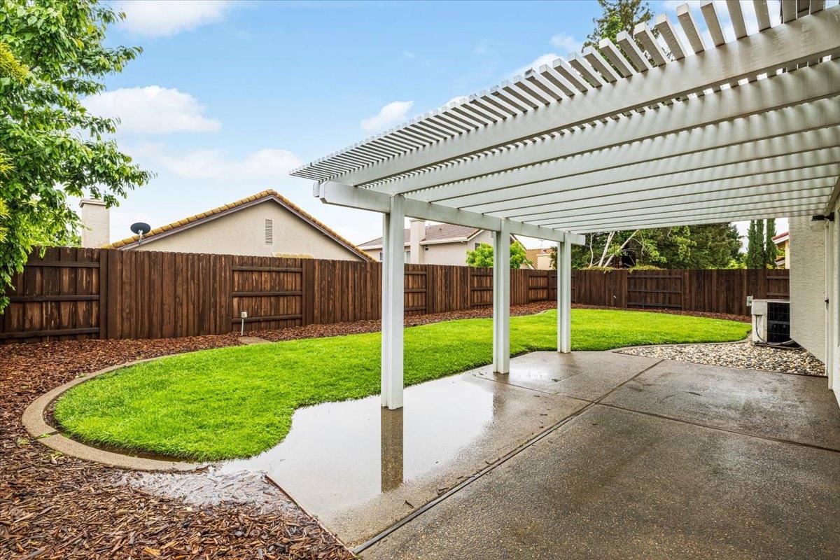 114 Kerwin Way Folsom, CA 95630 - Photo 25 of 29 a view of a house with a backyard